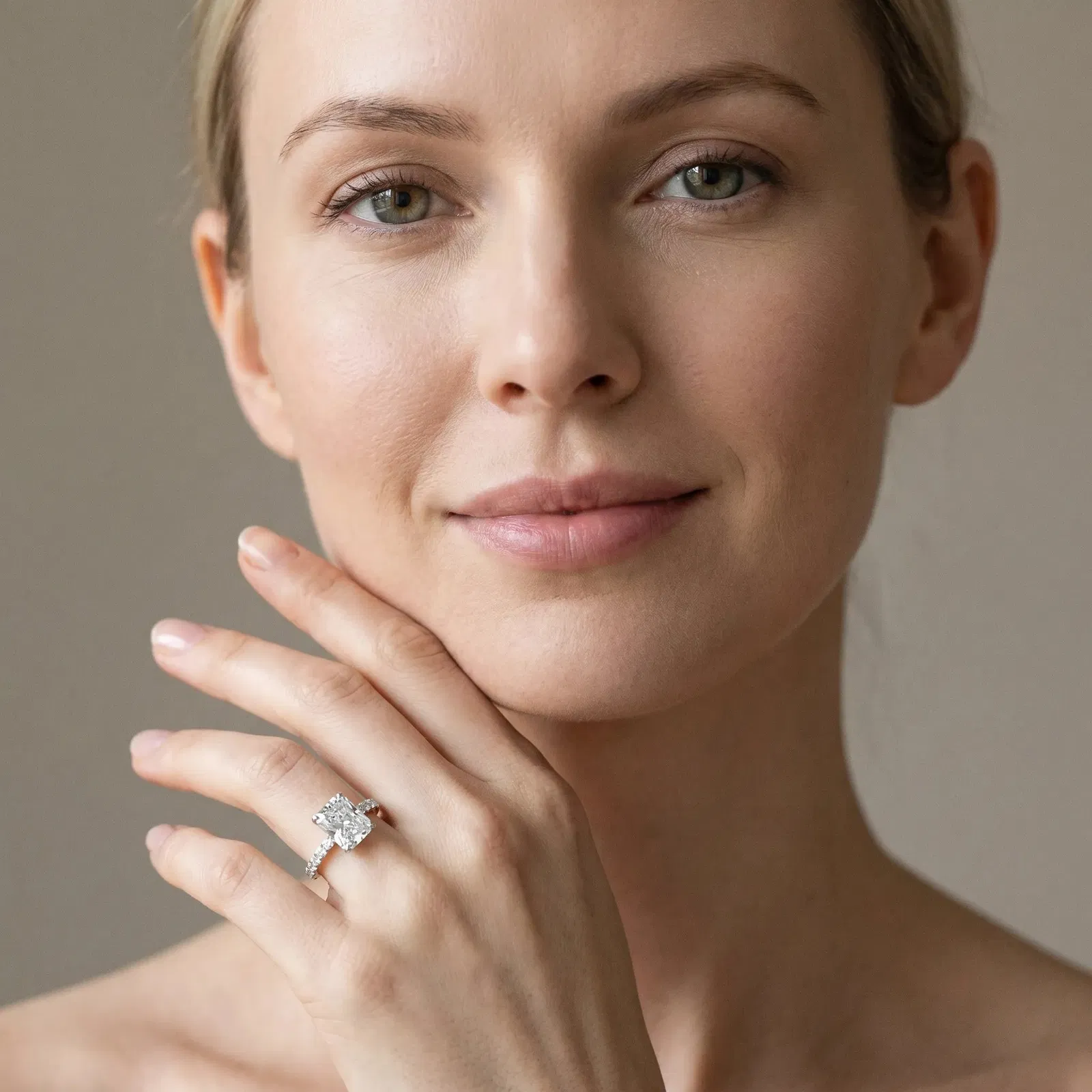 Radiant Cut Diamond Solitaire Ring with Round Pavé Band and Four-Prong Setting Platinum