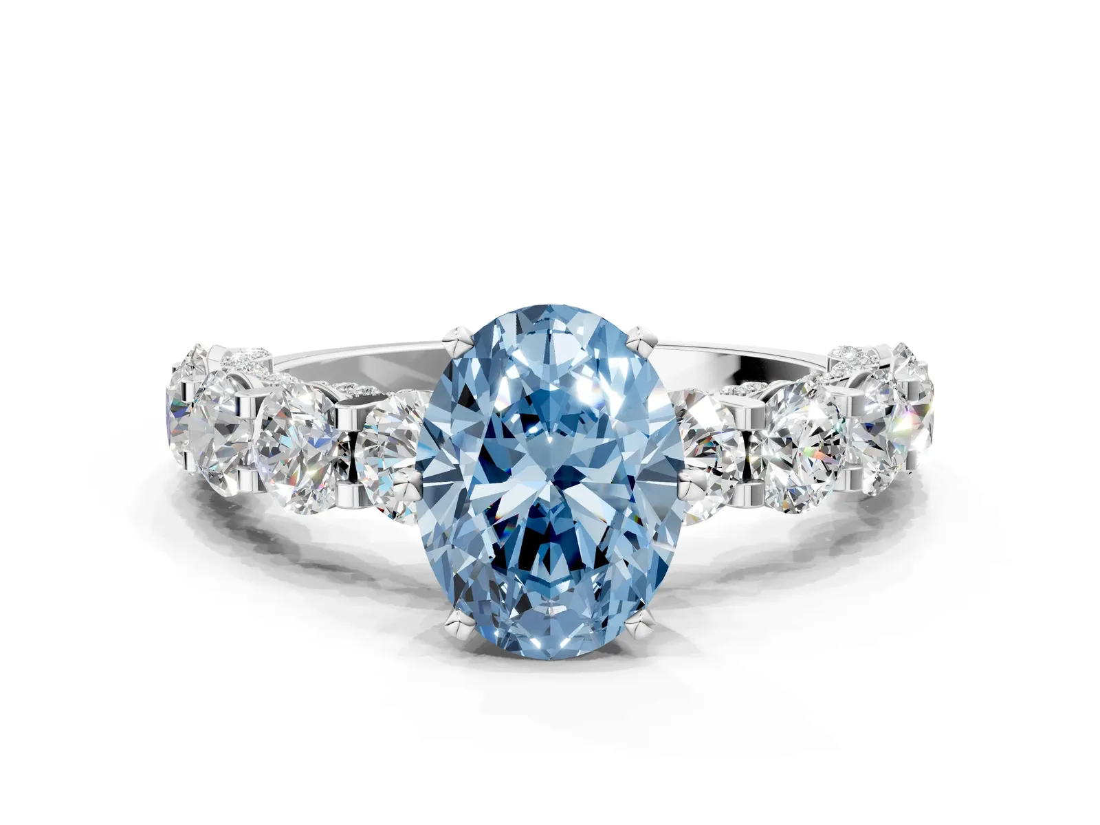Fancy Blue Oval Cut Diamond Side Stone Engagement Ring with Four-Prong Setting White gold