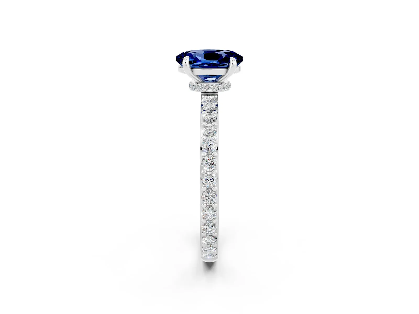 Oval Cut Blue Sapphire Solitaire Engagement Ring with Pavé Band and Four-Prong Setting Platinum