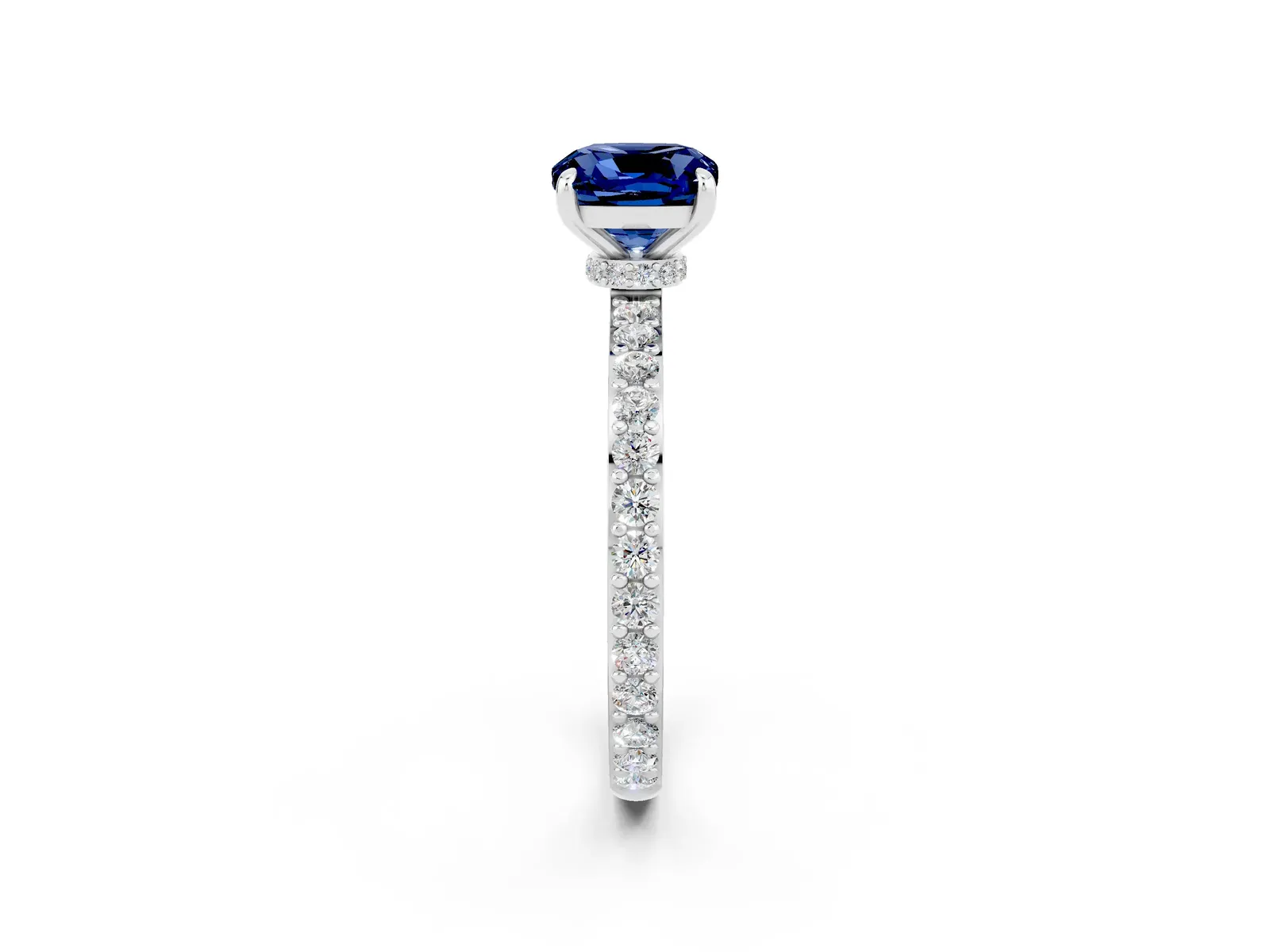 Cushion Cut Blue Sapphire Solitaire Engagement Ring with Pavé Band and Four-Prong Setting Platinum