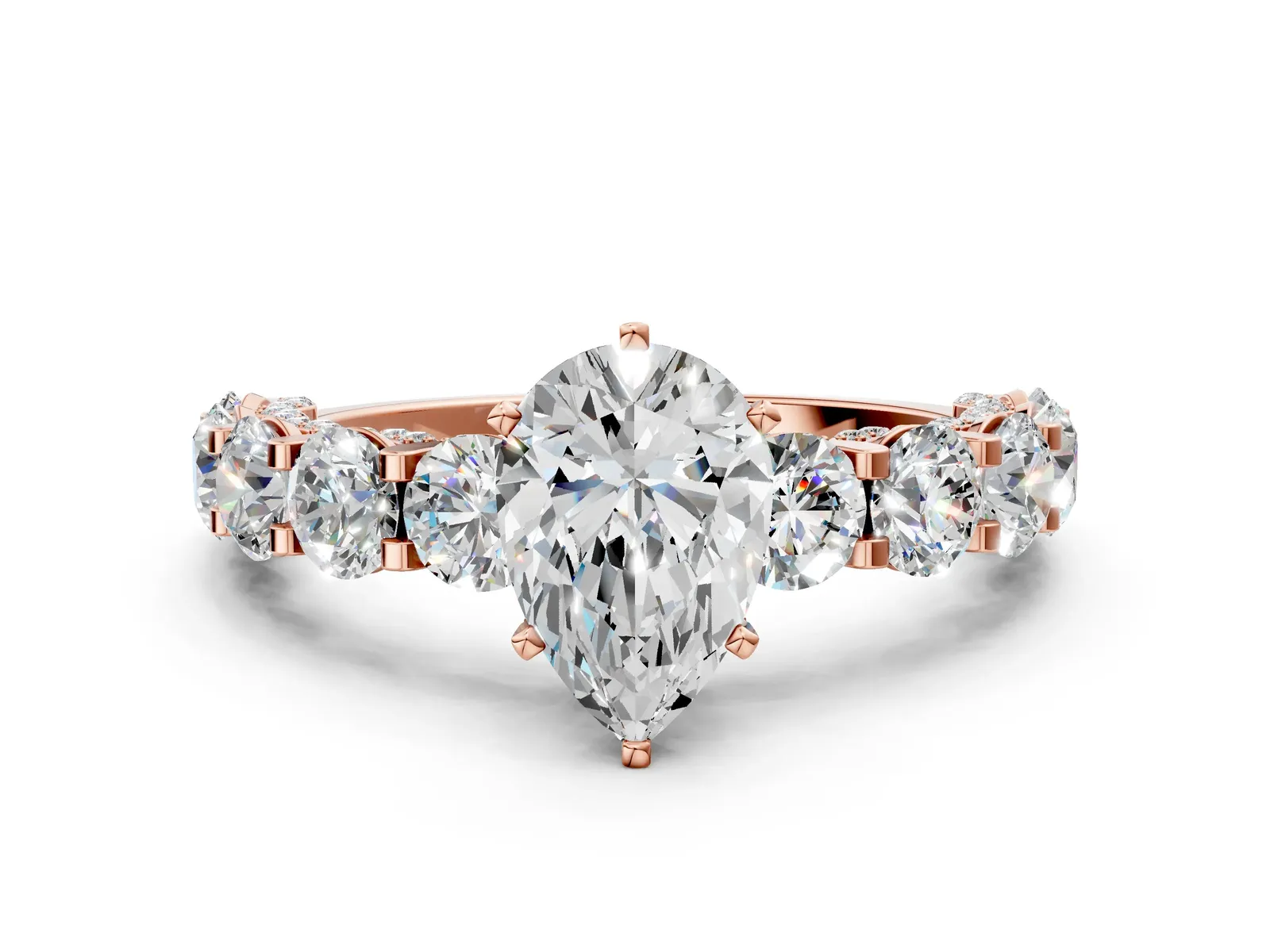 Pear Cut Diamond Side Stone Engagement Ring with Four-Prong Setting Rose gold